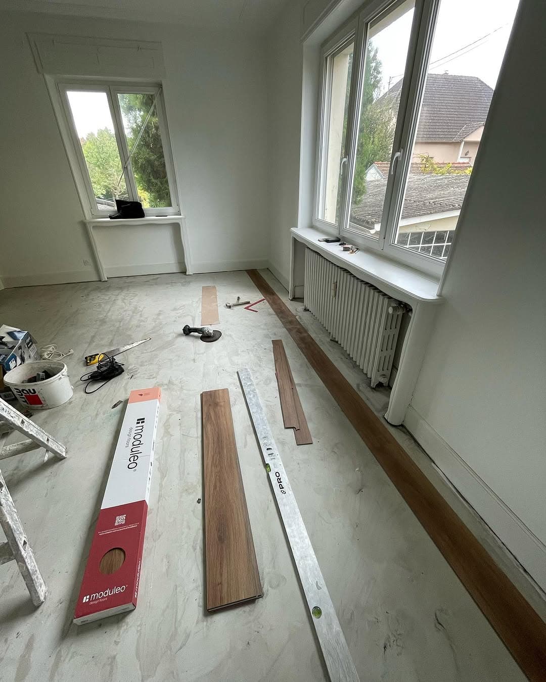pose lames sol pres fenetres pendant travaux